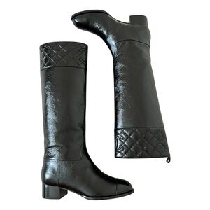 Brand new black CHANEL shiny leather riding boots. In stores now. They are perf